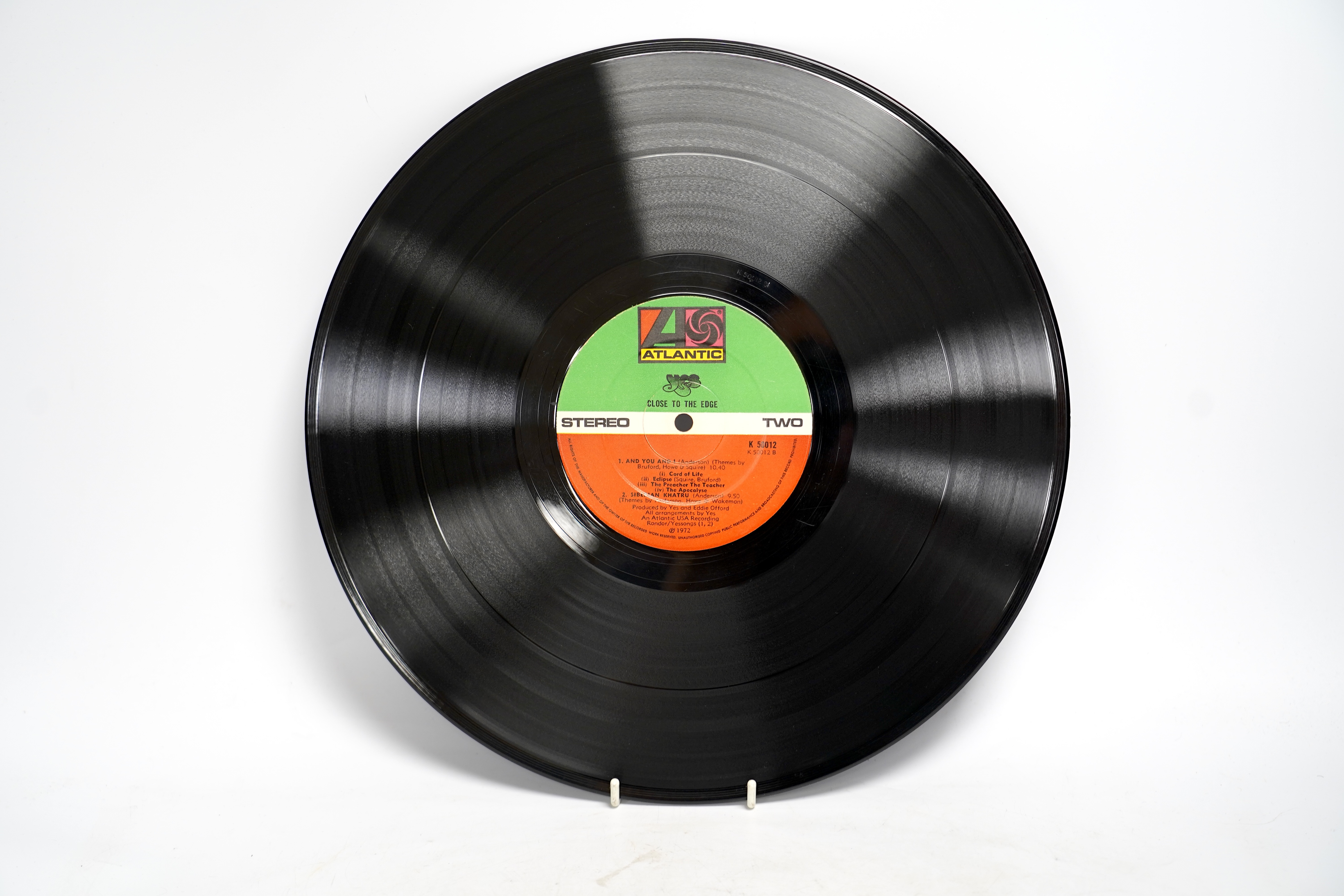 Five Yes LP record albums; Yes on Atlantic red and plum 588190 with insert lyric sheet, The Yes Album LP record album, on Atlantic red and plum label 2400101 in gatefold cover, Time and a Word on Atlantic red and plum la